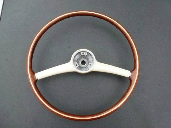 Vintage steering wheel restoration with walnut veneer